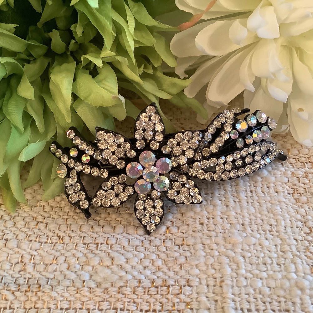 Large hair clip with rhinestones.